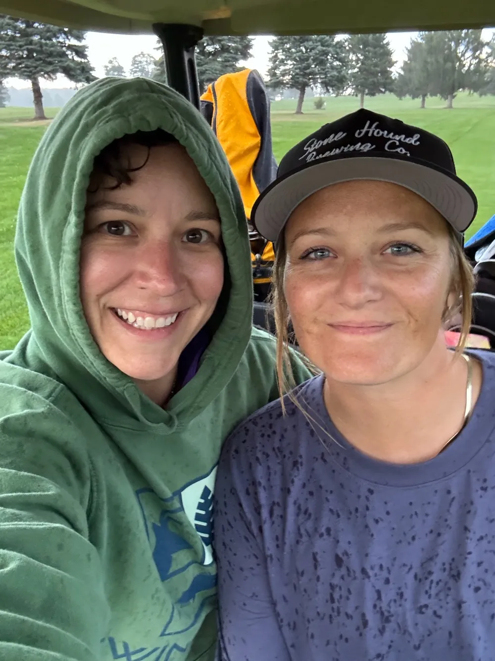Two more league golfers sharing a cart at Centennial Golf Course